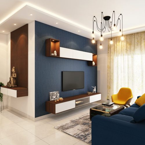 Contemporary living room design with plush sofa, flat-screen TV, and modern furniture.